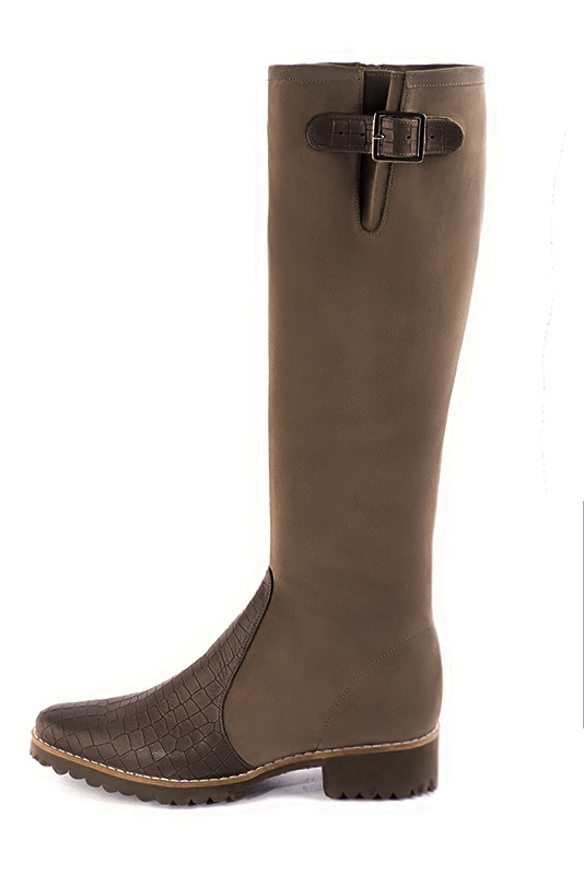 French elegance and refinement for these dark brown knee-high boots with buckles, 
                available in many subtle leather and colour combinations. Record your foot and leg measurements.
We will adjust this beautiful boot with inner zip to your leg measurements in height and width.
The outer buckle allows for width adjustment.
You can customise the boot with your own materials, colours and heels on the "My Favourites" page.
 
                Made to measure. Especially suited to thin or thick calves.
                Matching clutches for parties, ceremonies and weddings.   
                You can customize these knee-high boots to perfectly match your tastes or needs, and have a unique model.  
                Choice of leathers, colours, knots and heels. 
                Wide range of materials and shades carefully chosen.  
                Rich collection of flat, low, mid and high heels.  
                Small and large shoe sizes - Florence KOOIJMAN